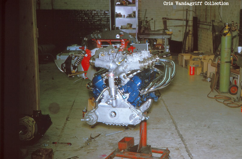 Name:  HSC Mk1 Ford Engine on Stand With Chassis Behind Credit Vandagriff.jpg
Views: 2743
Size:  96.6 KB