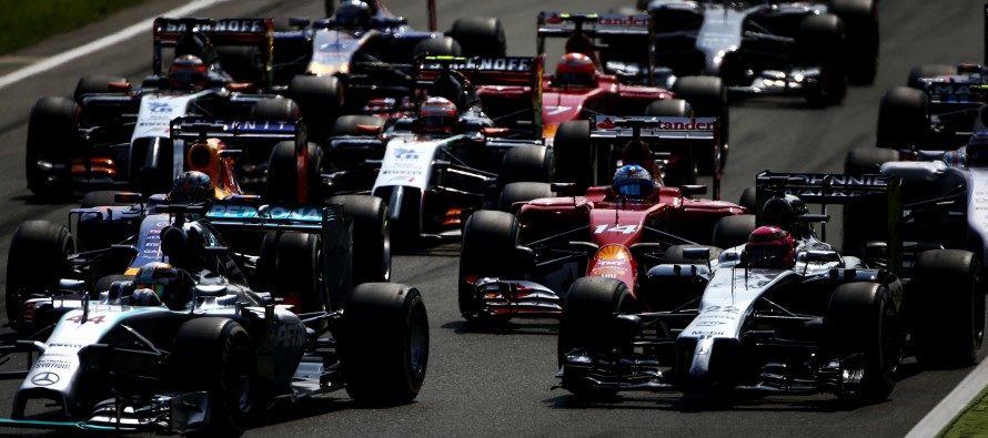 Name:  The-field-sqeeze-into-the-first-corner-in-the-opeing-lap-890x395_c.jpg
Views: 3412
Size:  103.6 KB