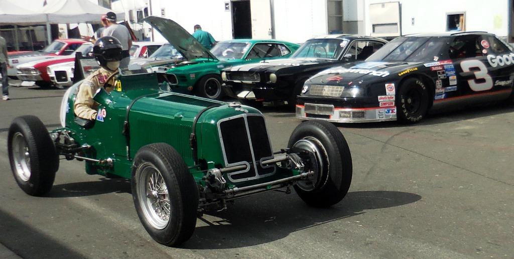 Name:  Chris MacAllister in his 1938 ERA  14 B heading out to the circuit..jpg
Views: 1203
Size:  151.1 KB