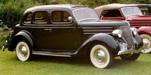 Name:  1936_Ford_Model_68_730_De_Luxe_Fordor_Touring_Sedan_GEF887.jpg
Views: 618
Size:  51.4 KB
