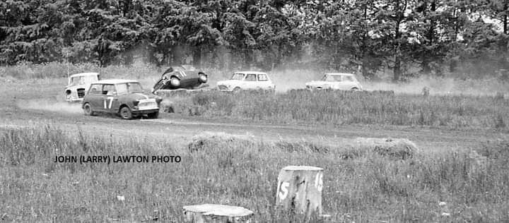 Name:  Motor Racing Kerepehi #024 TVCC 1967 Feb Minis Elf Mini on two wheels #2 close up John Larry Law.jpg
Views: 729
Size:  50.1 KB