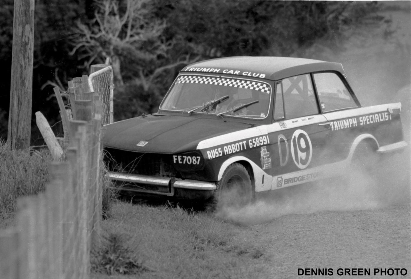 Name:  NSCC 1976 #0180 B Cosseys Hill Climb 1976 Triumph Vitesse Russ Abbott in fence 172 kb arch R Cam.jpg
Views: 523
Size:  172.3 KB