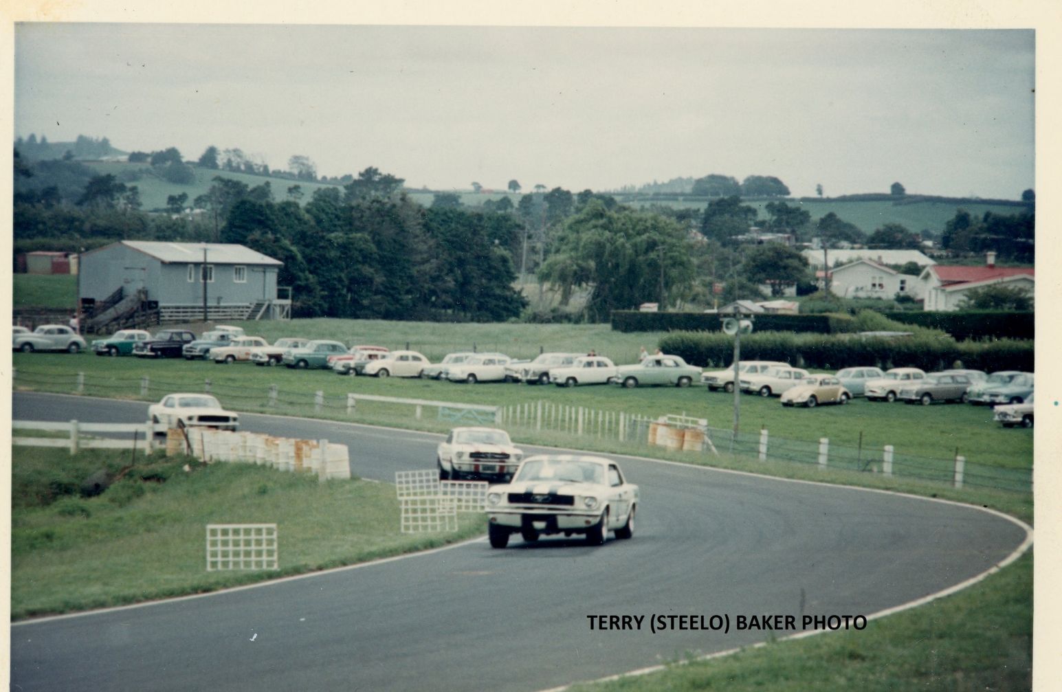 Name:  Pukekohe 1967 #239 1966 - 67 Q Mustang trio the Esses by the Woolshed Fahey 1st arch JLL Terry S.jpg
Views: 23
Size:  179.2 KB