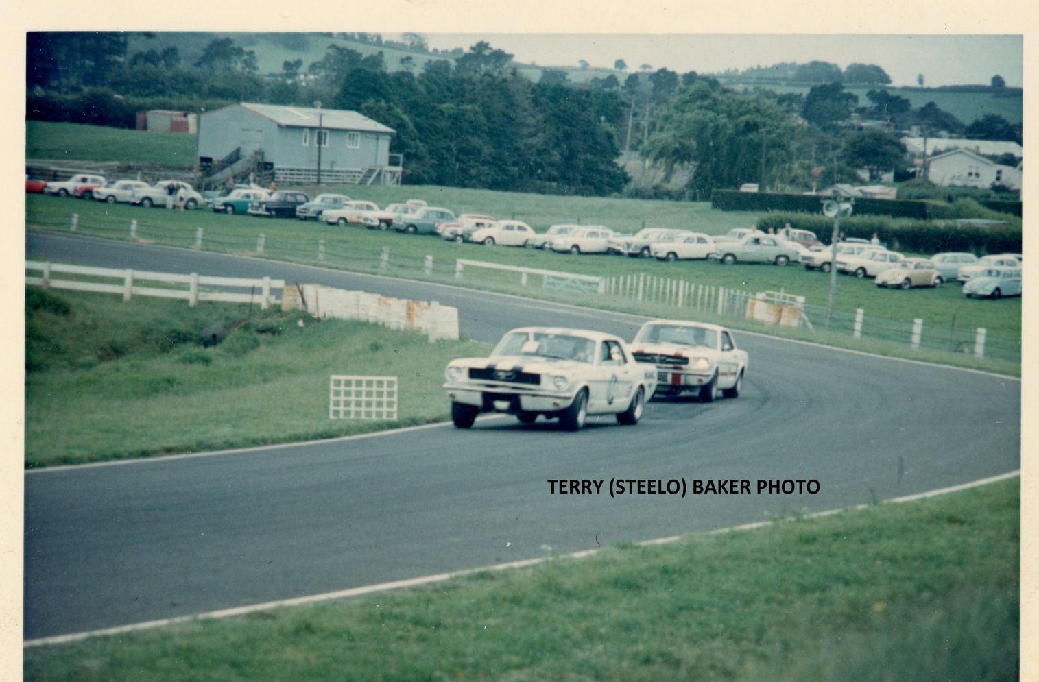 Name:  Pukekohe 1967 #237 1966 - 67 Q Mustang pair the Esses by the Woolshed arch JLL Terry Steelo Bake.jpg
Views: 24
Size:  179.0 KB