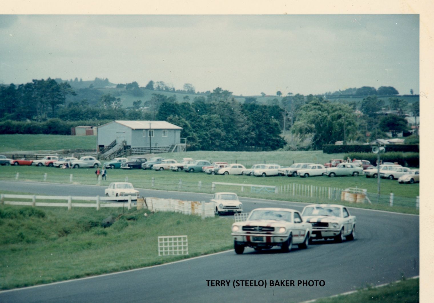 Name:  Pukekohe 1967 #236 1966 - 67 Q Mustangs Cortina and Triumph 2000s the Esses by the Woolshed arch.jpg
Views: 25
Size:  179.0 KB